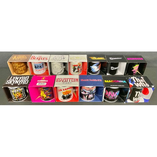 631 - Music Interest - a large quantity of ceramic mugs, printed with various music legends of rock, pop a... 