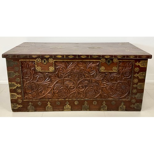 1629A - A late 19th / early 20th century Indo-European carved secure chest, ornate brass inlay, the front ca... 