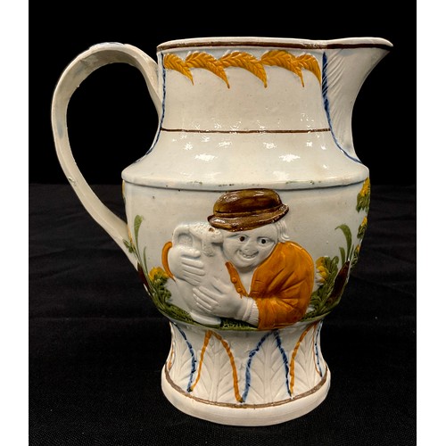 1226A - A 19th century pearl ware Prattware jug, moulded in relief decoration of gentleman with his ale, 14c... 