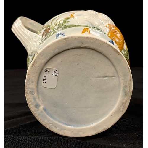 1226A - A 19th century pearl ware Prattware jug, moulded in relief decoration of gentleman with his ale, 14c... 