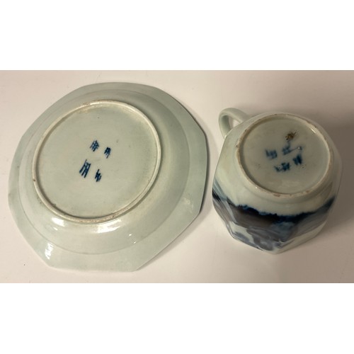 1162A - A Bow Jumping Boy pattern octagonal coffee can and saucer, hand-painted in under-glaze blue with a s... 