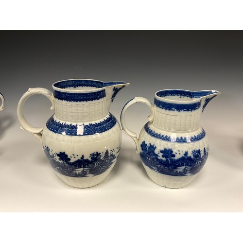 1161A - A Leeds pottery pearlware water jug, transfer printed in the long Bridge pattern, 22.4cm high, gradu... 