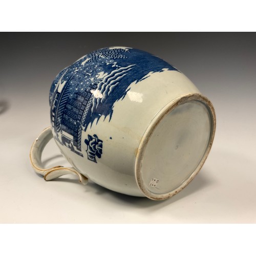 1161A - A Leeds pottery pearlware water jug, transfer printed in the long Bridge pattern, 22.4cm high, gradu... 