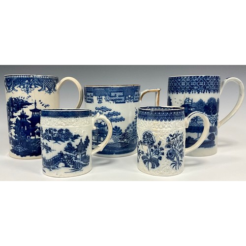 1209A - An early 19th century pearlware blue and white transfer printed Willow pattern mug,  14cm high, othe... 