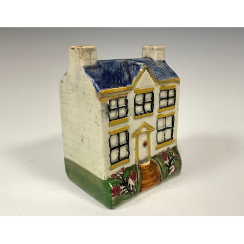 1261A - An English pottery money box, modelled as a Wesleyan chapel, 10cm high, c.1815.