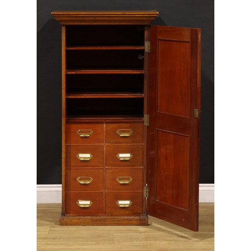 2158 - An Edwardian mahogany estate office document filing cabinet, oversailing top above a raised and fiel... 