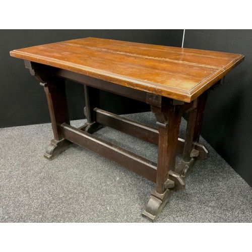 2161 - A Gothic Revival oak alter table, over sailing top, shaped supports, tied stretchers, 75cm high, 118... 