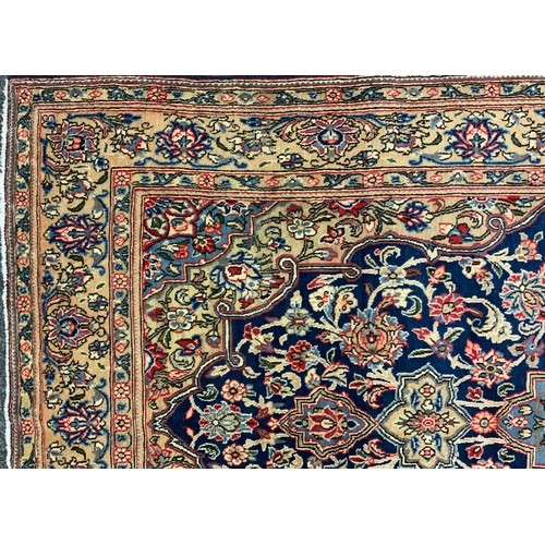 1149 - A North west Persian Sarouk rug, hand-knotted with a central Navette-shaped medallion, within a fiel... 