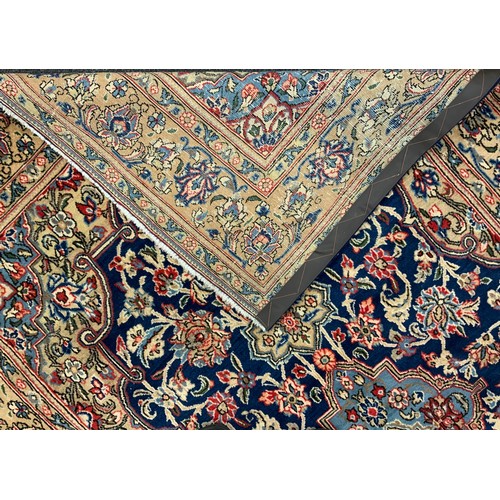 1149 - A North west Persian Sarouk rug, hand-knotted with a central Navette-shaped medallion, within a fiel... 