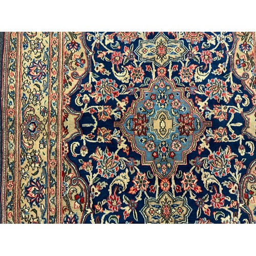 1149 - A North west Persian Sarouk rug, hand-knotted with a central Navette-shaped medallion, within a fiel... 