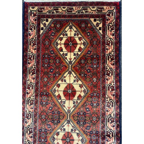 1147 - A North west Persian Malayer runner, 293cm x 67cm.