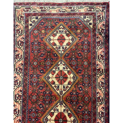 1147 - A North west Persian Malayer runner, 293cm x 67cm.