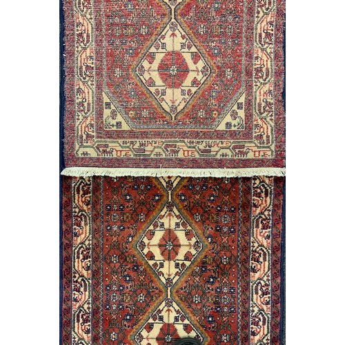 1147 - A North west Persian Malayer runner, 293cm x 67cm.