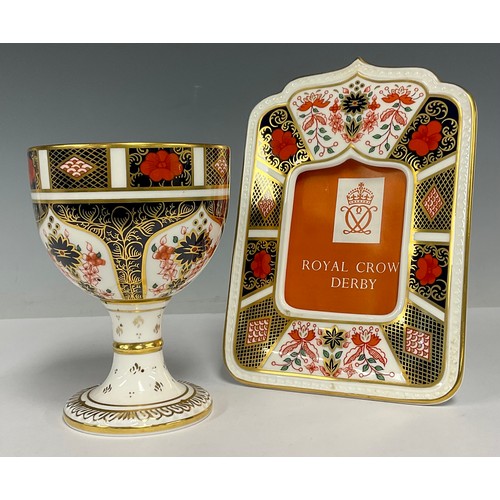 8 - A Royal Crown Derby 1128 Imari pattern photograph frame, 17cm high, first quality; a 1128 pattern go... 