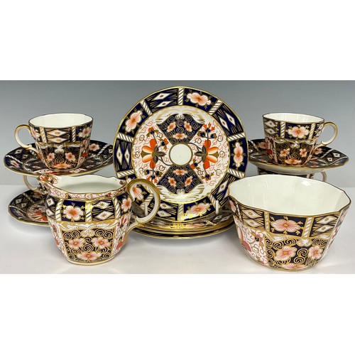 28 - A Royal Crown Derby 2451 Imari pattern tea service for four, comprising sugar basin, cream jug, side... 