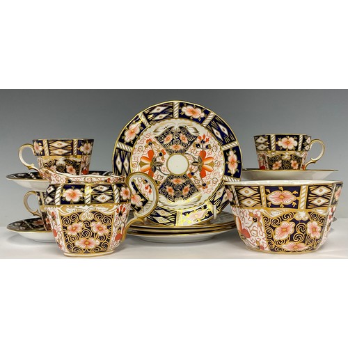 28 - A Royal Crown Derby 2451 Imari pattern tea service for four, comprising sugar basin, cream jug, side... 