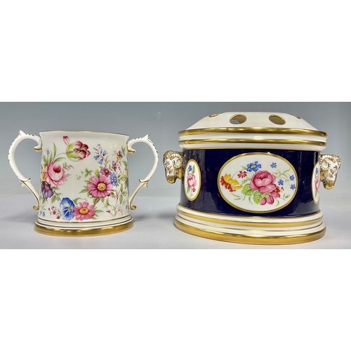 57 - A Lynton Porcelain Company demi-lune bough pot, printed with roses within gilt oval cartouches, on a... 