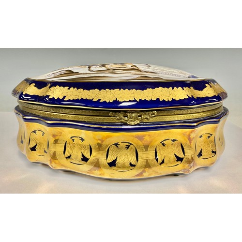 64 - A large Continental porcelain gilt metal mounted serpentine casket, the hinged cover decorated with ... 