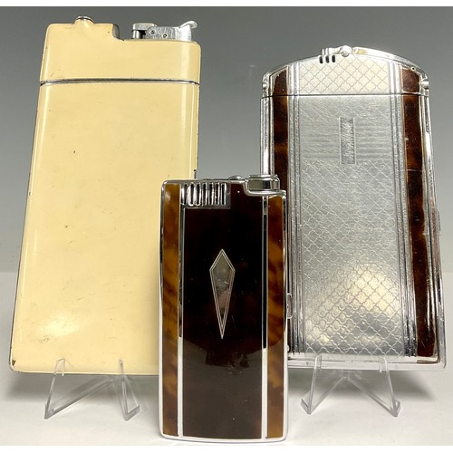 83 - An Art Deco enamelled combination cigarette case and lighter, 17cm high; others similar (3)