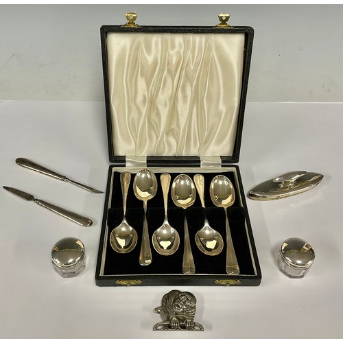 95 - A set of six silver teaspoons, Sheffield 1959, cased; a silver part buckle, London 1986; a pair of s... 