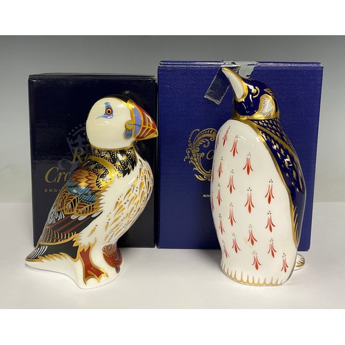 126 - A Royal Crown Derby paperweight, Puffin, gold stopper, boxed; another, Penguin, gold stopper, boxed ... 