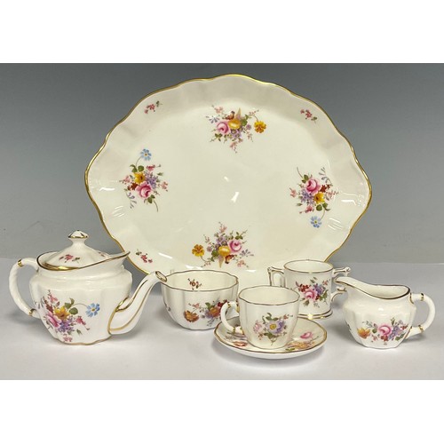 139 - A Royal Crown Derby Posie pattern miniature cabaret tea service comprising tea pot, cup, saucer, cre... 