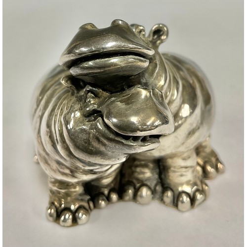 157 - A Continental silver model, of a pair of characterised hippos, 5.5cm high, marked high, 121g gross