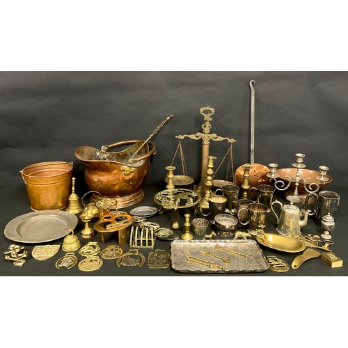 167 - Metalware - a copper helmet shaped coal scuttle; a set of 19th century style brass balance scales; a... 