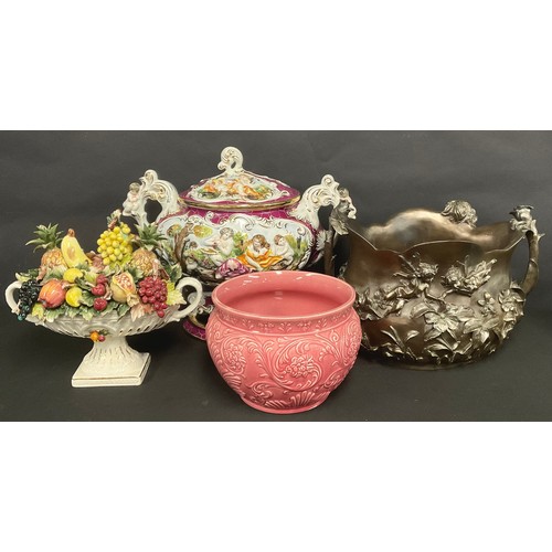 194 - A large Capodimonte porcelain two handled pedestal table centrepiece and cover, decorated with class... 