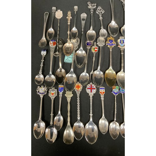 320 - A collection of twenty Victorian and later silver souvenir spoons, some Continental; others silver p... 