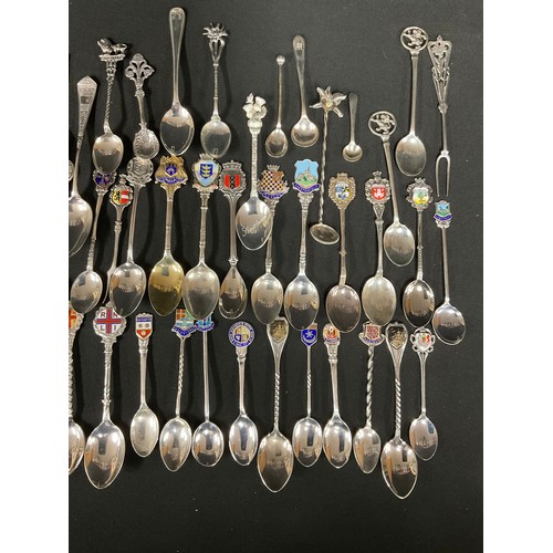 320 - A collection of twenty Victorian and later silver souvenir spoons, some Continental; others silver p... 