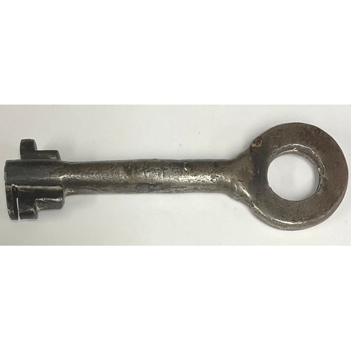 321 - A 17th century forged iron key, possibly a shackle key, hollow barrel, reputedly from The Tower of L... 