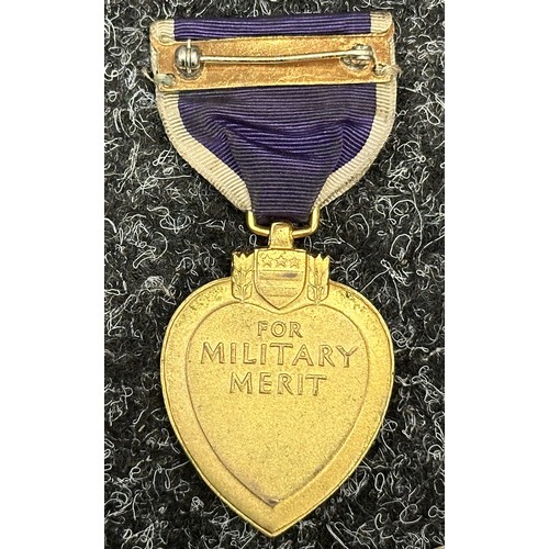 3056 - US Purple Heart with four Oak Leaf Clusters. Complete with ribbon and pin. Un-named.