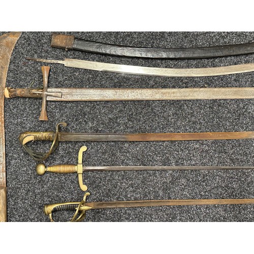 3109 - Collection of “Barn found” edged weapons, including a Sudanese Kaskara, etc.