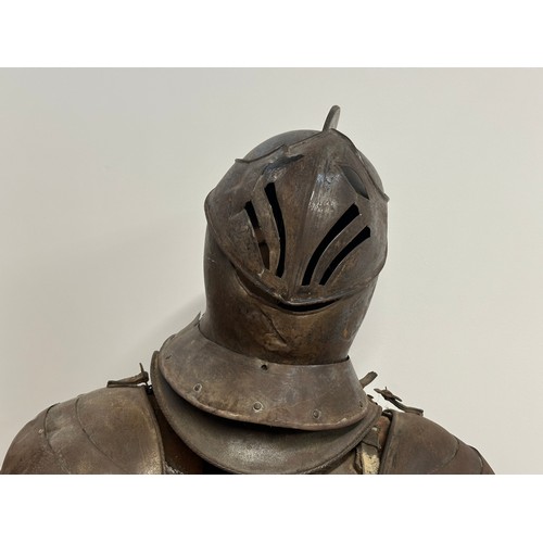 3115 - A Victorian Era Replica Suit of Armour. Constructed from thin sheet steel with some etched decoratio... 