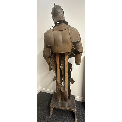 3115 - A Victorian Era Replica Suit of Armour. Constructed from thin sheet steel with some etched decoratio... 