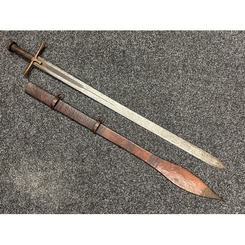 3117 - Sudanese Kaskara Sword with double edged fullered blade 935mm in length. Steel crossguard and leathe... 