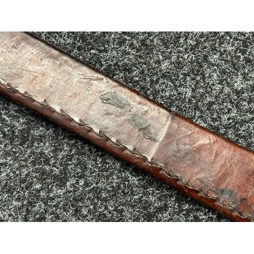 3117 - Sudanese Kaskara Sword with double edged fullered blade 935mm in length. Steel crossguard and leathe... 