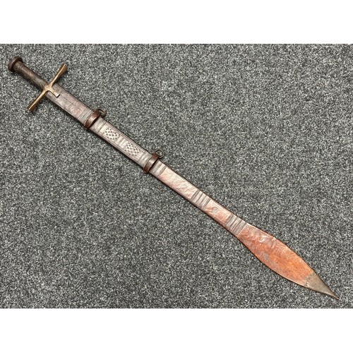 3117 - Sudanese Kaskara Sword with double edged fullered blade 935mm in length. Steel crossguard and leathe... 