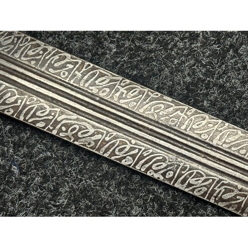 3118 - Sudanese Kaskara Sword with double edged fullered patterned blade 950mm in length. Brass crossguard.... 