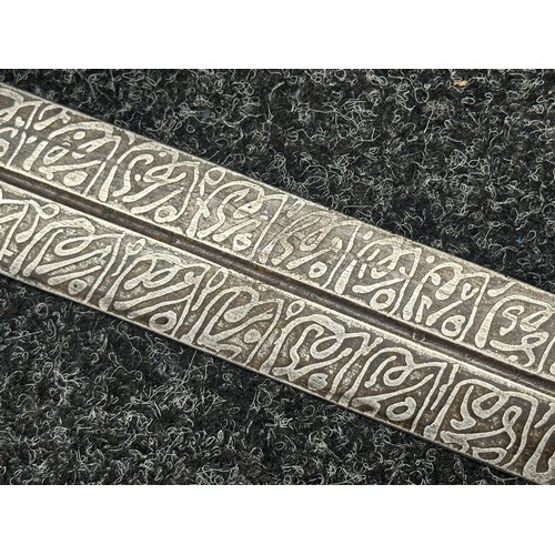 3118 - Sudanese Kaskara Sword with double edged fullered patterned blade 950mm in length. Brass crossguard.... 