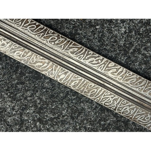 3118 - Sudanese Kaskara Sword with double edged fullered patterned blade 950mm in length. Brass crossguard.... 