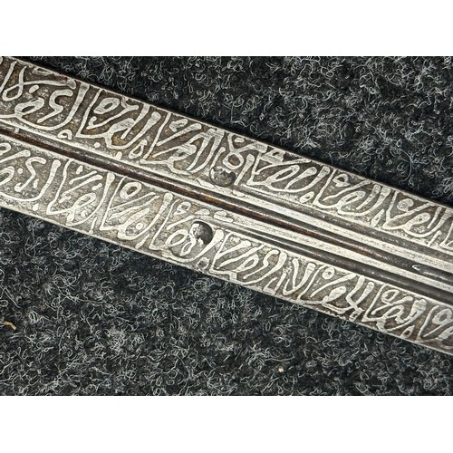 3118 - Sudanese Kaskara Sword with double edged fullered patterned blade 950mm in length. Brass crossguard.... 