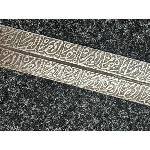 3118 - Sudanese Kaskara Sword with double edged fullered patterned blade 950mm in length. Brass crossguard.... 