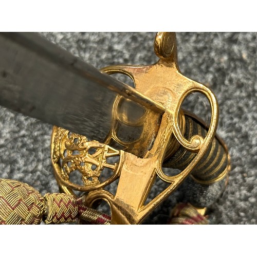 3124 - William IV British Officers Sword with pipe backed blade with etched decoration, 817mm in length. Gu... 