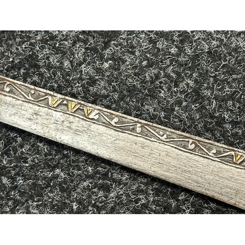 3146 - African sword with single edged blade 650mm in length with decoration to both side with brass inlay.... 