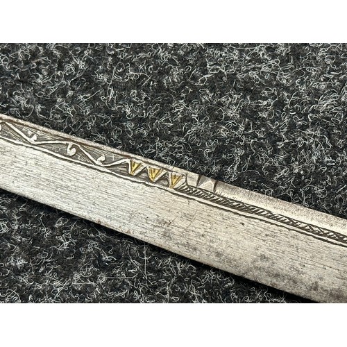 3146 - African sword with single edged blade 650mm in length with decoration to both side with brass inlay.... 