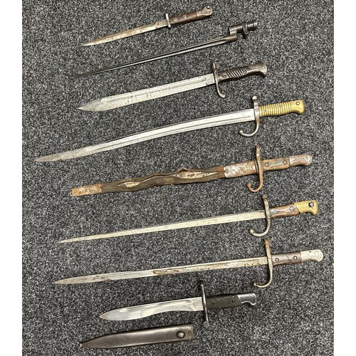 3148 - A collection of Bayonets to include French Chassepot, Modified WW1 German Butcher Bayonet, Spanish M... 