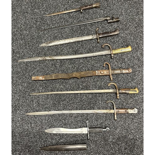 3148 - A collection of Bayonets to include French Chassepot, Modified WW1 German Butcher Bayonet, Spanish M... 