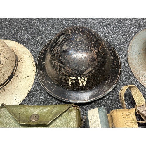 3201 - A collection of WW2 British militaria to include:, Fire Warden steel helmet, Fire Guard steel helmet... 